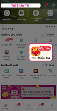 Mở Ví MoMo, Chọn dịch vụ Túi Thần Tài bằng cách: